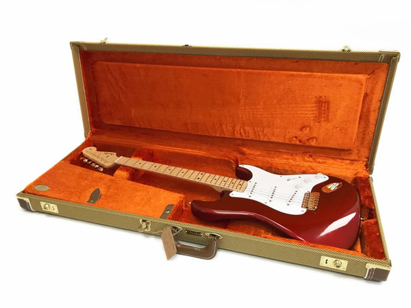 Fender Stratocaster electric guitar in candy apple red finish with maple neck in vintage tweed hard shell case with orange plush interior lining