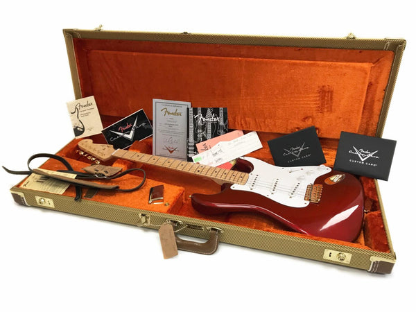 Fender Stratocaster electric guitar in candy apple red with maple neck and gold hardware in tweed hard case with orange plush interior and Fender certificates and paperwork