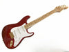 Fender Stratocaster electric guitar in red with white pickguard, maple fretboard, and gold hardware on white background