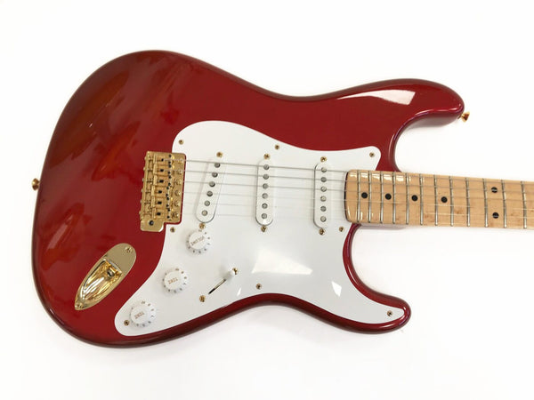 Red electric guitar with white pickguard, gold hardware, and maple neck on white background for Coffee House Guitars product listing