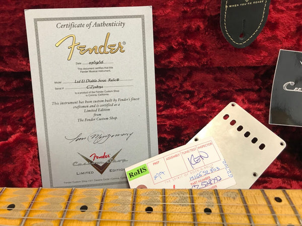 Fender Custom Shop Certificate of Authenticity for Ltd El Diablo Strat Relic dated 07/19/16 with guitar neck, red plush case interior, and Fender pickup cover.