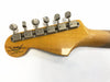 Fender Custom Shop Limited Edition vintage guitar tuning pegs on worn maple headstock close-up