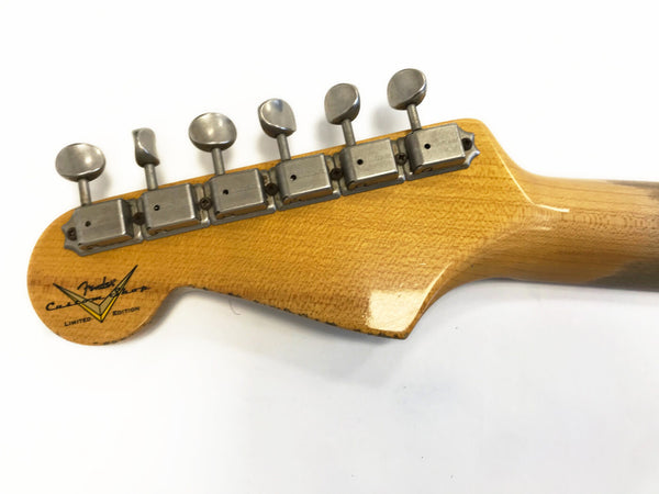 Fender Custom Shop Limited Edition vintage guitar tuning pegs on worn maple headstock close-up