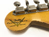 Close-up of Fender Custom Shop Limited Edition guitar headstock with vintage tuning machines and natural wood finish