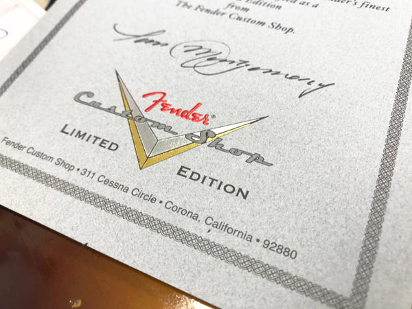 Close-up of Fender Custom Shop Limited Edition certificate with gold and silver emblem and decorative border from Corona, California