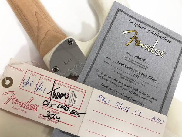 Fender Stratocaster Pro Closet Classic guitar neck plate with serial number 3564, Fender certificate of authenticity dated 08/31/06, and Fender assembly and inspection tag with signatures and handwritten notes.