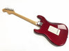Back view of cherry red electric guitar with maple neck and white backplate on white background
