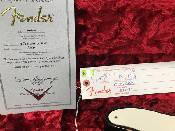 Fender Custom Shop Certificate of Authenticity for 53 Telecaster Relic guitar with serial number R16414, dated 02/07/17, alongside Fender inspection and assembly tag on red plush guitar case lining.