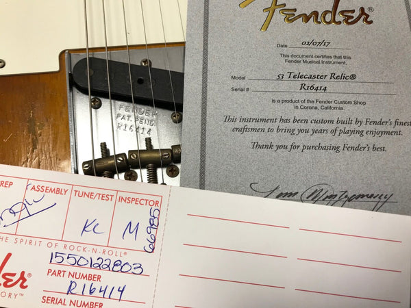 Close-up of Fender Telecaster Relic guitar bridge with part number R16414 and Fender Custom Shop certificate dated 02/07/17 showing model and serial number details.