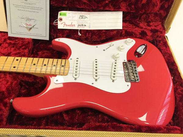 Fender Custom Shop 2022 red Stratocaster electric guitar with maple neck and white pickguard inside a red plush-lined hardshell case with Fender certification and tag