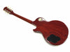 Back view of cherry red electric guitar with glossy finish and gold hardware tuning pegs on neck, black control cavity cover, and Gibson Les Paul control plate on guitar body