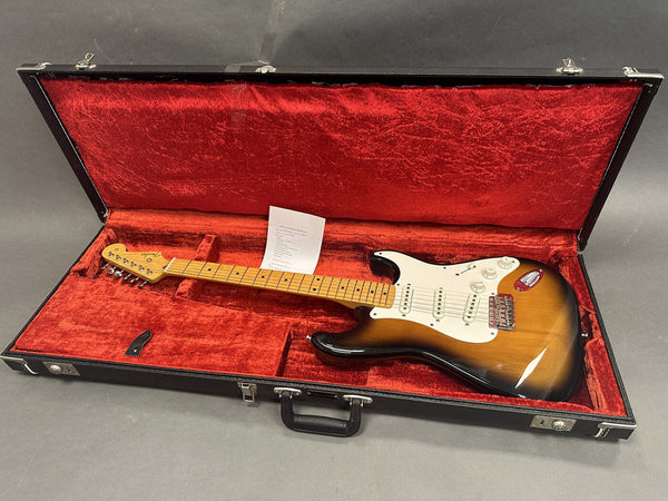 Fender Stratocaster electric guitar in sunburst finish inside black hardshell case with red plush interior lining and included paperwork