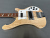 Natural finish electric bass guitar with white pickguard, chrome bridge, four control knobs, toggle switch, and rosewood fretboard