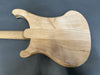 Back view of Coffee House Guitars electric guitar showing natural wood grain finish and smooth neck joint on gray background