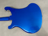 Back view of electric guitar with glossy blue finish and double cutaway body design on gray background