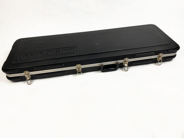 Black hard guitar case with metal latches and handle, embossed with Music Man logo, designed for electric guitars.