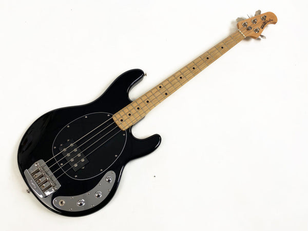 Black electric bass guitar with maple neck and fretboard, chrome hardware, and single humbucker pickup on white background