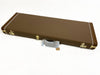 Brown rectangular hard guitar case with gold latches and handle wrapped in protective material on white background