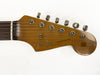 Fender Stratocaster guitar headstock with tuning pegs and original contour body decal on white background