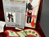 Burns Shadows Custom Signature guitar certificate of authenticity number 373 with signed certificate and promotional booklet featuring red Burns electric guitar in velvet-lined case