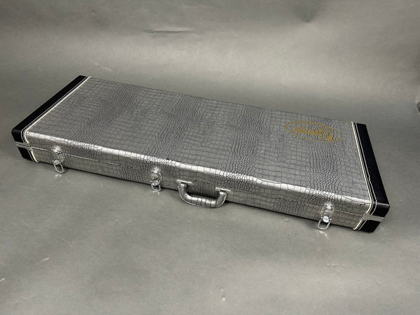 Silver textured hard guitar case with black reinforced corners and metal latches, guitar carrying case with handle for electric guitars