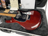 Ernie Ball Music Man electric guitar with cherry red finish and maple neck in black plush-lined hard case with certificates and accessories