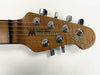 Ernie Ball Music Man StingRay bass guitar natural wood headstock with chrome tuning pegs and black nut on white background