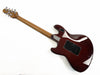 Back view of electric guitar with dark red glossy finish, figured wood neck, and chrome tuning pegs on white background