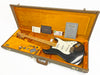 Fender Stratocaster electric guitar in black with maple neck and white pickguard inside vintage orange plush lined hard case, including certificate of authenticity and Fender custom care booklet