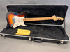 G&L Legacy electric guitar with sunburst finish and maple neck in black hard case with yellow cloth