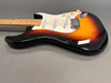 Sunburst electric guitar with maple neck and white pickguard on gray background from Coffee House Guitars