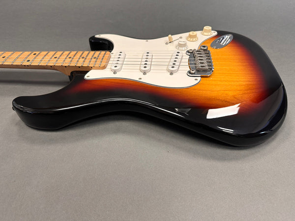 Sunburst electric guitar with maple neck and white pickguard on gray background from Coffee House Guitars