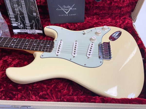 Fender Custom Shop vintage cream Stratocaster electric guitar with rosewood fingerboard and white pickguard in red plush-lined case with owner's manual and custom care booklet