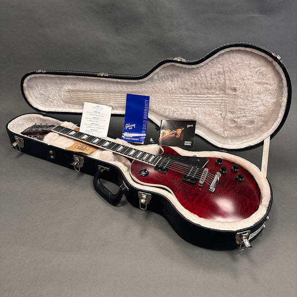 Gibson Les Paul electric guitar with cherry sunburst finish in plush lined black hard case with warranty card and owner's manual