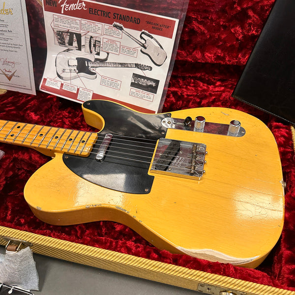 Vintage Fender Electric Standard Broadcaster model Telecaster guitar with natural worn finish and black pickguard in red velvet-lined hard case with Fender diagram and certificate