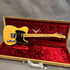 Vintage Fender Telecaster electric guitar with blonde finish and black pickguard in open tweed case with red plush interior at Coffee House Guitars
