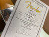 Fender Certificate of Authenticity for Jazzmaster Relic guitar model with serial number CZ519368 and Limited Edition metal neck plate close-up.