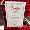 Fender Custom Shop Certificate of Authenticity for 56 Stratocaster JM guitar with serial number R103462 dated 11/05/2010 on red plush background