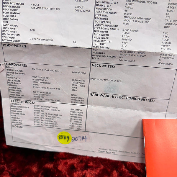 Vintage Fender Stratocaster specification sheet showing 2 color sunburst body finish, 4 bolt neck mounting, vintage Strat bridge hardware, Strat modern wiring electronics with 5-way selector switch, and bare wood neck back feel notes.