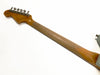 Vintage electric guitar maple neck with tuning pegs and worn finish on white background