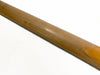 Close-up of natural wood guitar neck with smooth finish against white background