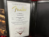 Fender Certificate of Authenticity for 65 Stratocaster Relic dated 08/14/2019 with serial number R97788 displayed in black leather holder from Fender Custom Shop in Corona California