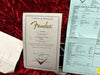 Fender Certificate of Authenticity for 59 Telecaster Journeyman Relic guitar dated 05/17/2010 with detailed Fender Custom Shop specification sheet on red velvet background