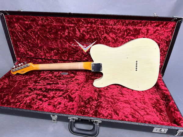 Vintage cream solid body electric guitar with maple neck in open black hard case with red velvet interior lining
