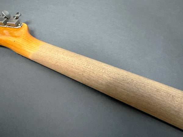 Close-up of guitar neck and headstock with tuning pegs on gray background, Coffee House Guitars product image