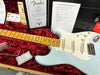 Fender Ltd 57 Stratocaster Jimi Hendrix signature electric guitar with maple neck and light blue body in red velvet-lined case with Fender authenticity certificate and Coffee House Guitars pre-sale checklist.