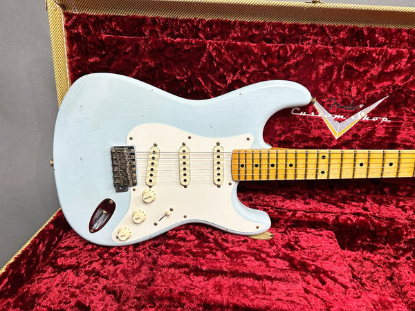 Fender Custom Shop vintage-style light blue electric guitar with maple fretboard in red velvet-lined guitar case