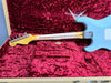 Fender Custom Shop electric guitar neck and back body in light blue finish inside red plush-lined hardshell case