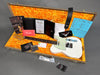 Fender Custom Shop white Telecaster electric guitar in open tweed hard case with certificate of authenticity, owner's manual, strap, care booklet, and Fender Custom Shop paperwork on bright orange plush interior
