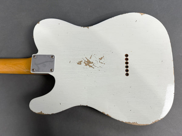 White relic electric guitar body with visible wear and vintage finish, maple neck plate close-up on gray background